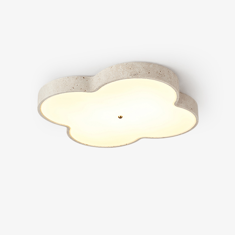Unlit cloud ceiling lamp showing the travertine body and the shallow 6 cm profile