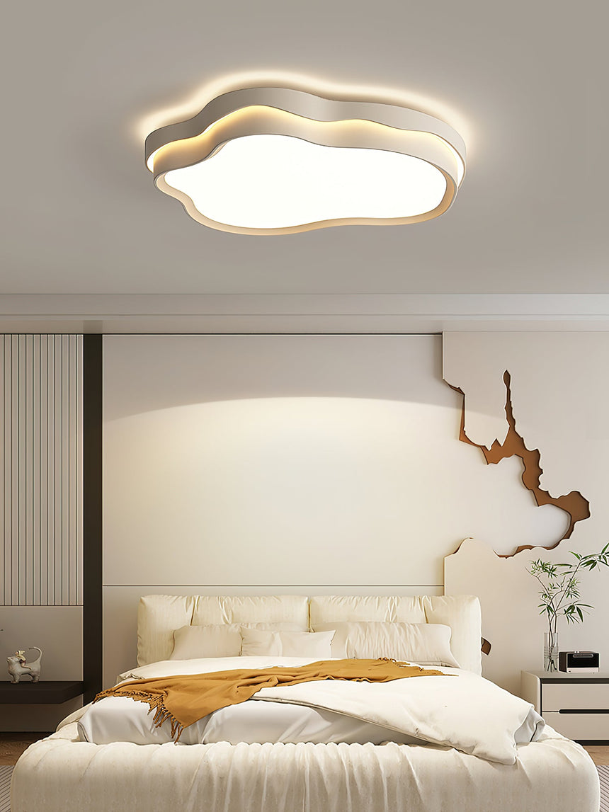 Close view of the stepped iron frame and white PE diffuser of the layered cloud ceiling light
