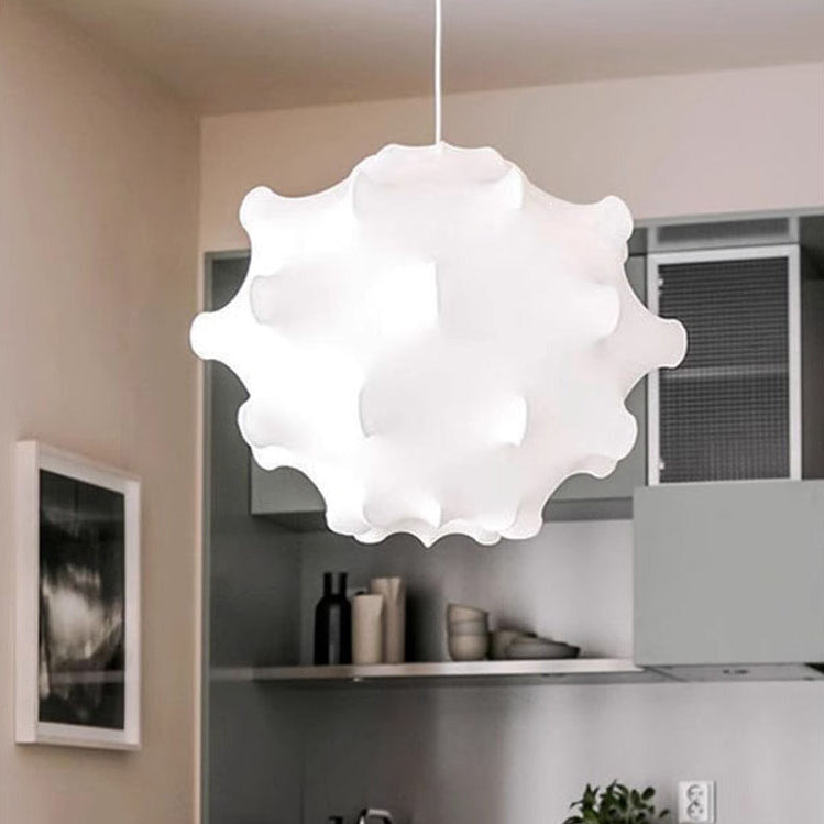 Cloud shade above a round table in a kitchen
