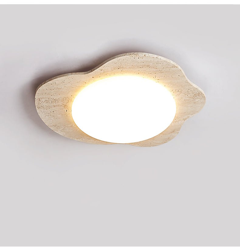 Travertine cloud ceiling fixture seen from the side showing its shallow depth