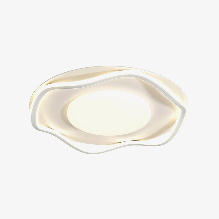 Cloud shaped lamp for ceilings in white iron and acrylic, shown against a plain background