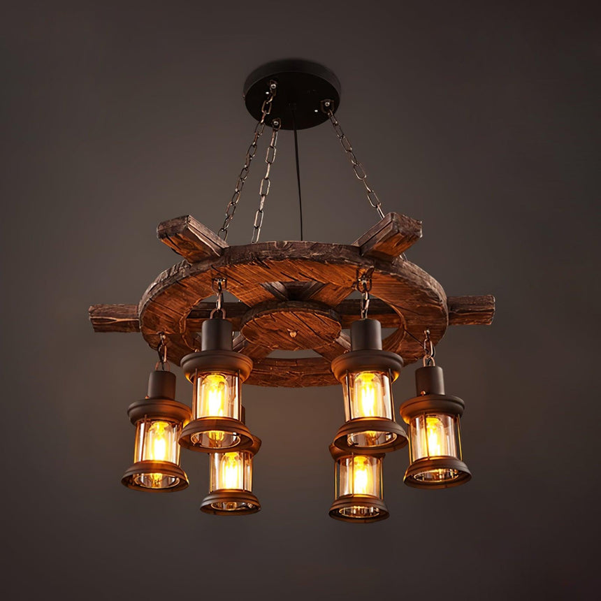 The wheel frame lit with six lanterns and iron hooks in view