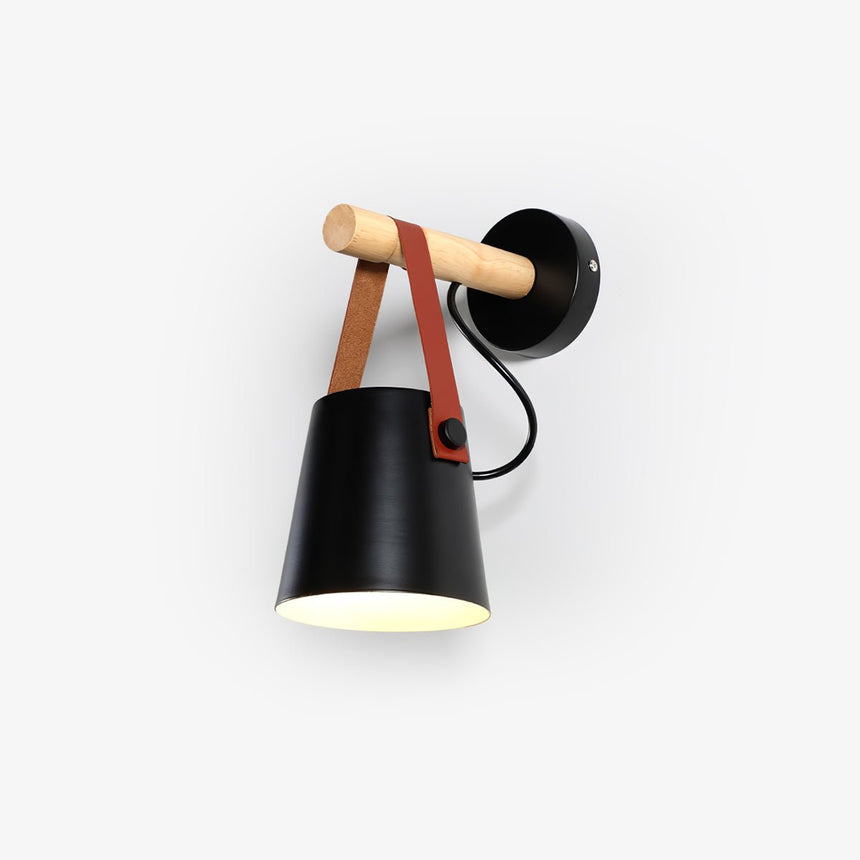Cone wall sconce, a black metal shade hung from a wood bar by a strap