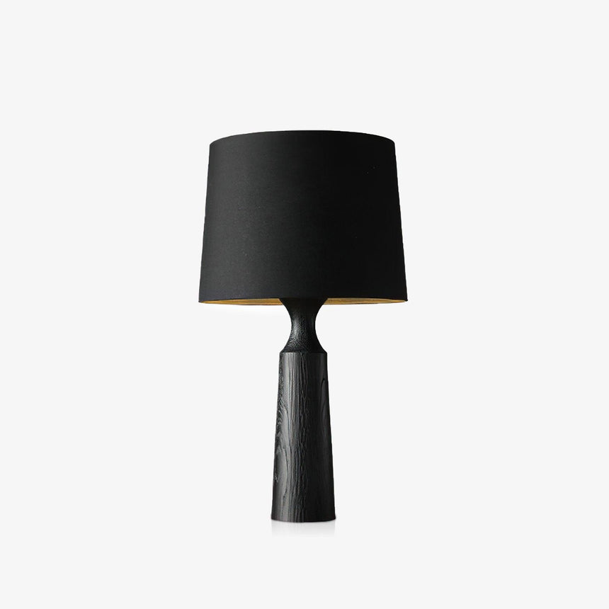 Console table lamp in black seen from the front on a pale ground