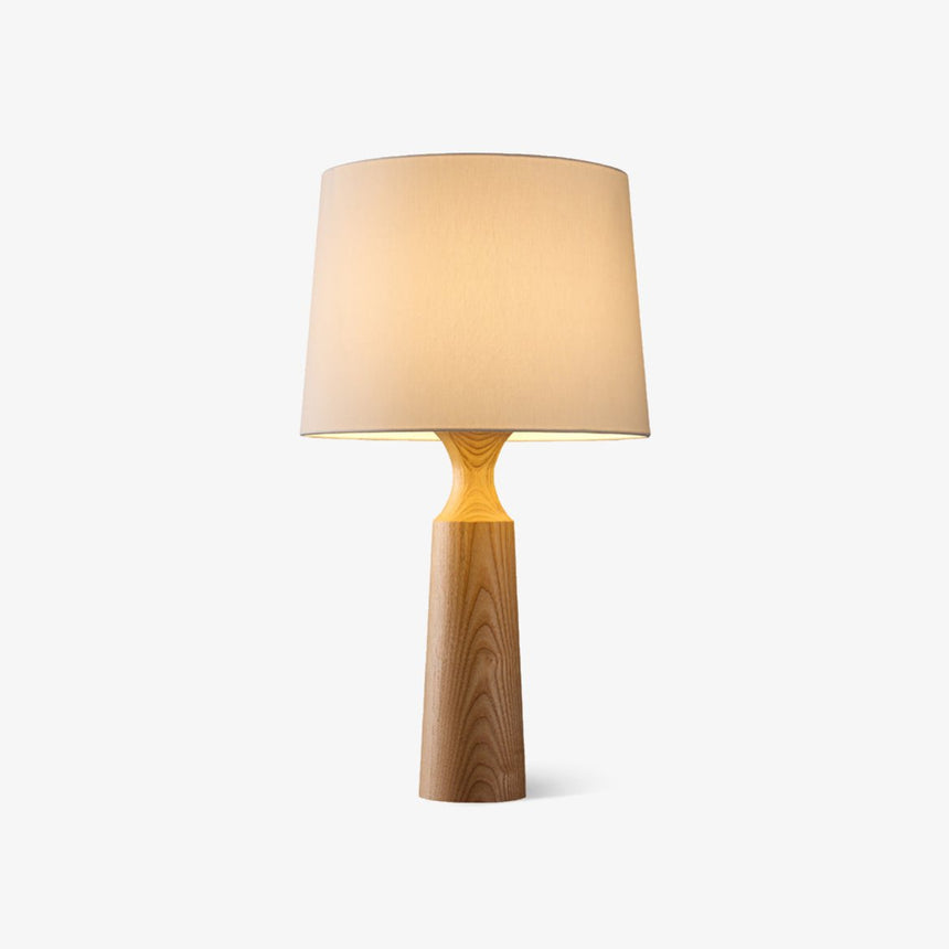Console table lamp in light wood with a white shade on a plain ground
