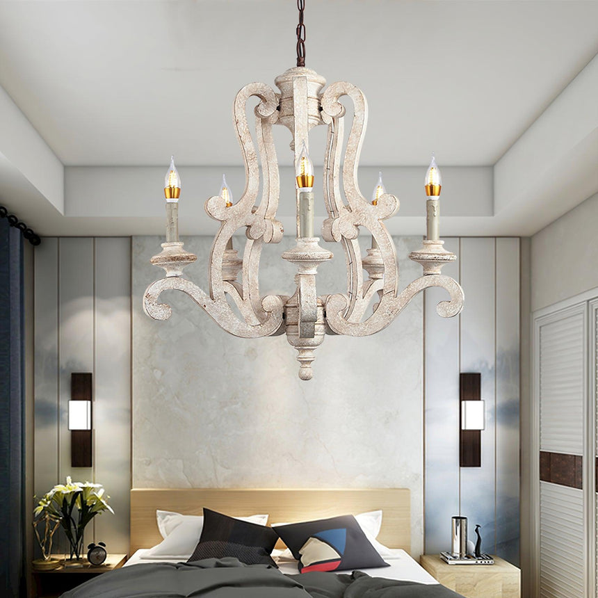 Hung in a bedroom above a dark headboard and a bedside table