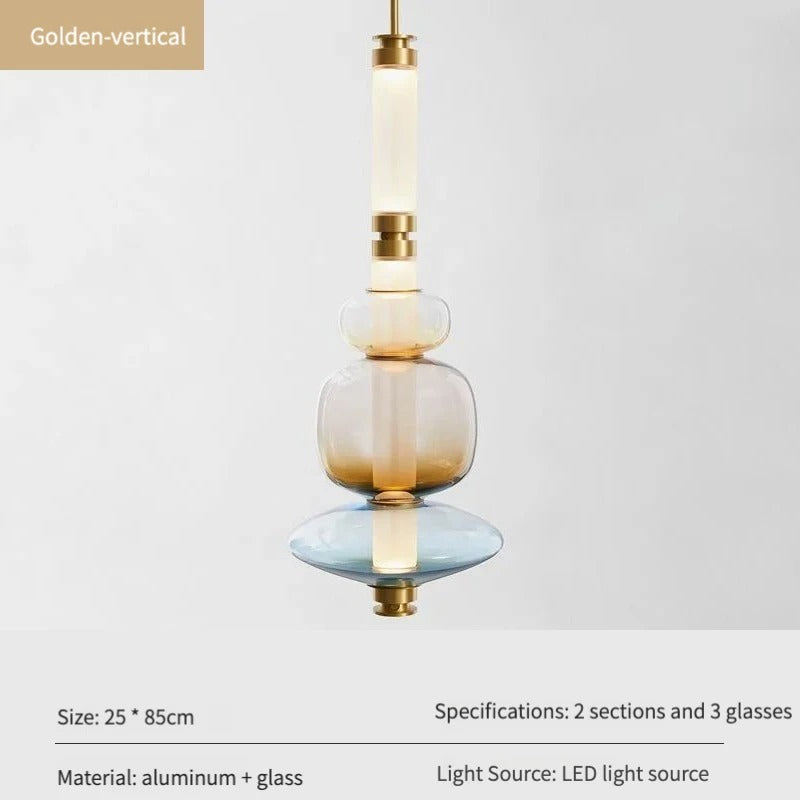 The gold version shown with its two metal sections and three glass beads