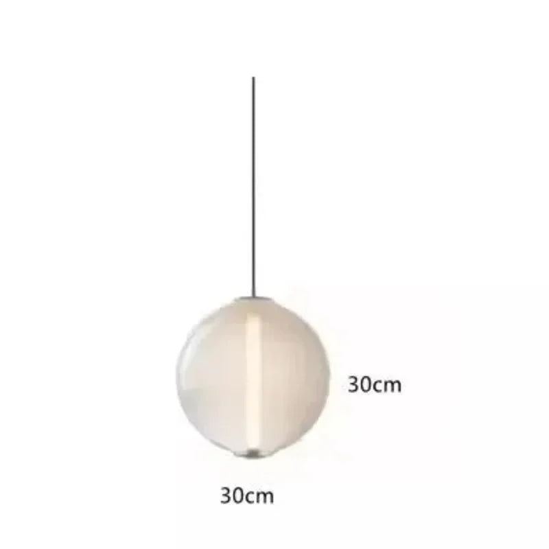 The white sphere drawn with its 30 cm width marked