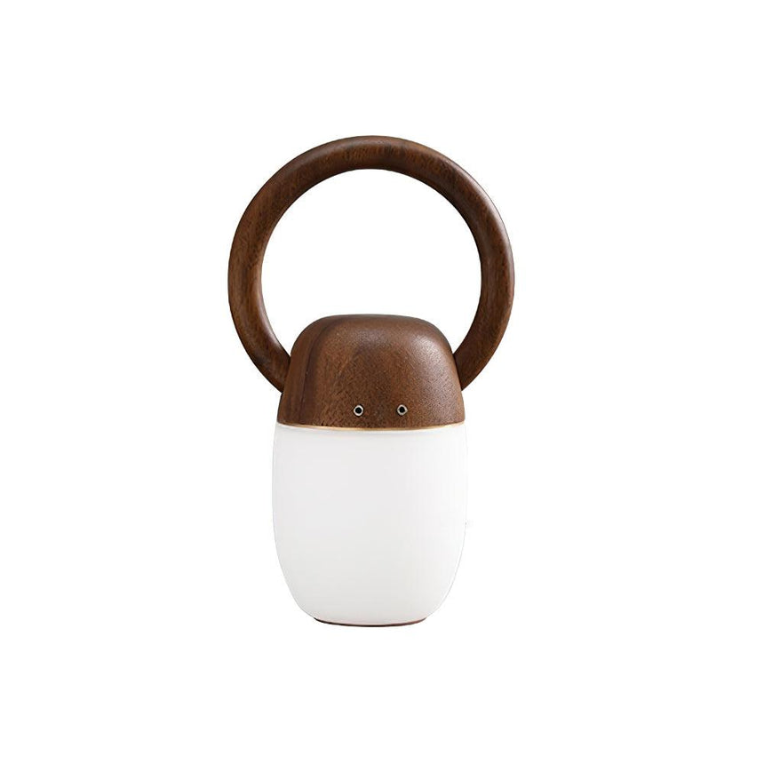 Dimmable bedside lamp with the walnut cap and ring handle, front view