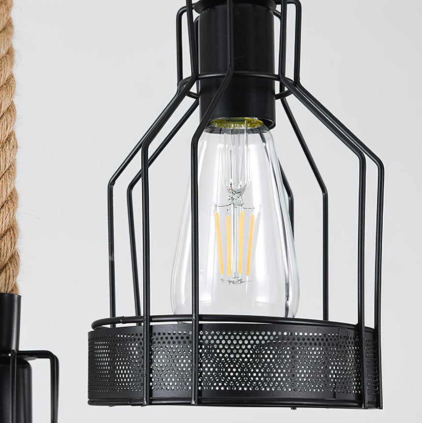 One iron cage shade with an Edison filament lamp lit inside it