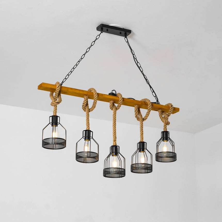 Beam chandelier seen across a pale room above a table and chairs
