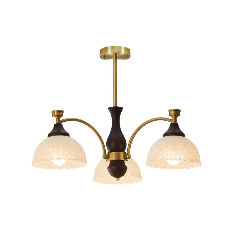 The three light build, three ribbed domes on a dark wood column