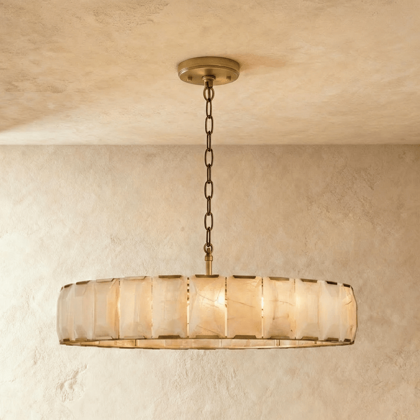 The widest stone drum in a brass frame hung from a chain