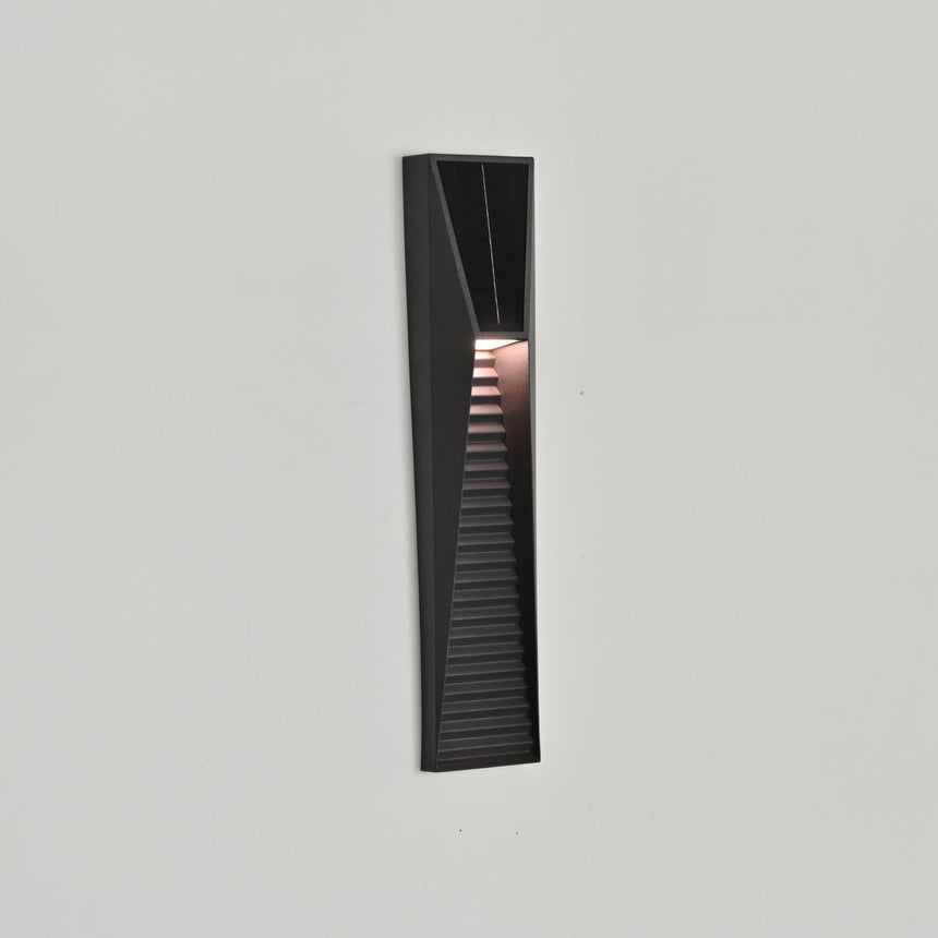 The solar light seen at an angle on a light wall, the tapered shape visible
