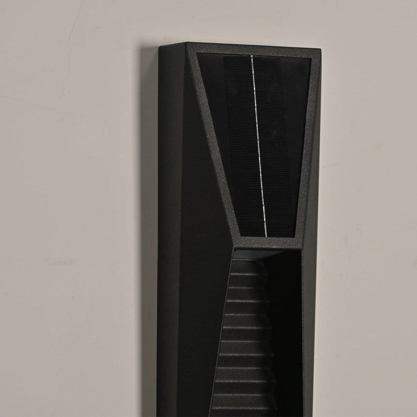 The top of the housing from the side, the cell above the louvered face