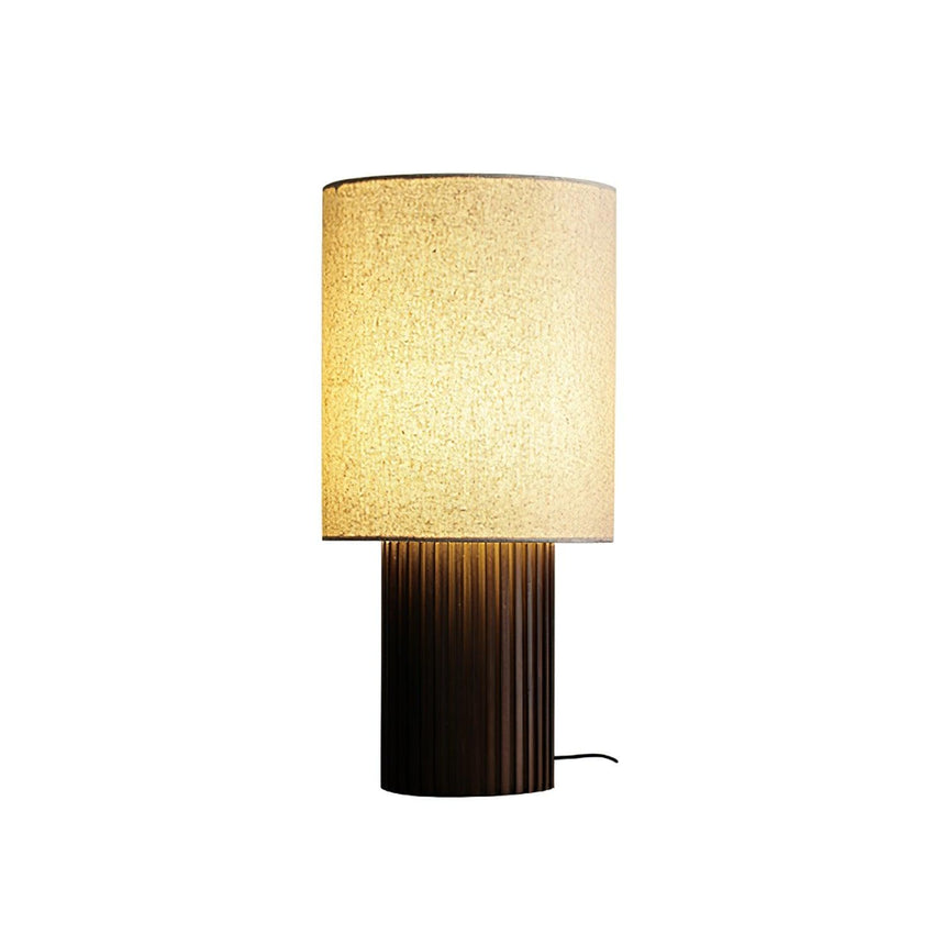 Entryway table lamp with the walnut fluted base, plain background