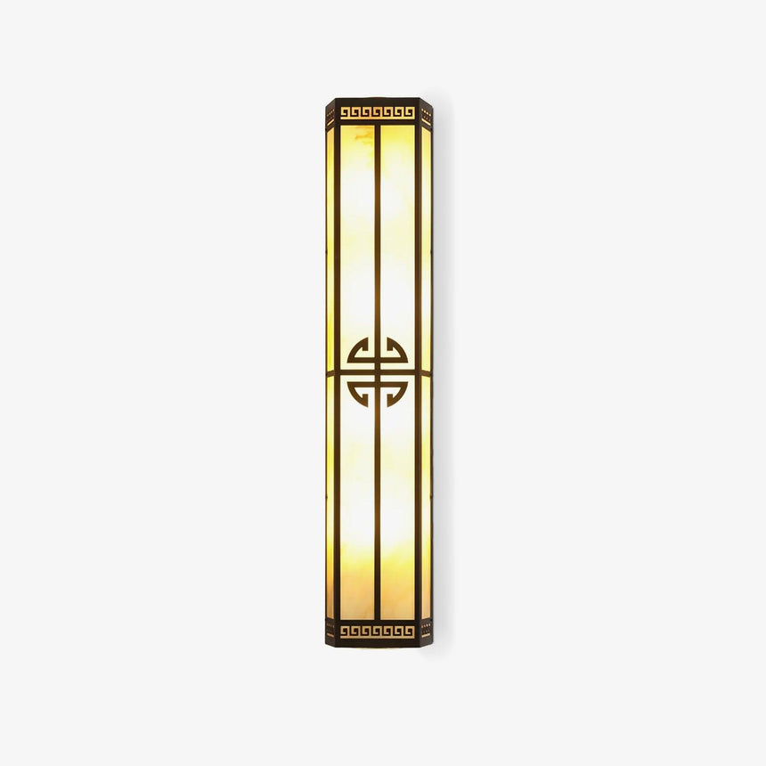 Tall exterior wall sconce, a slim lantern column with glowing panels and a round fretwork medallion
