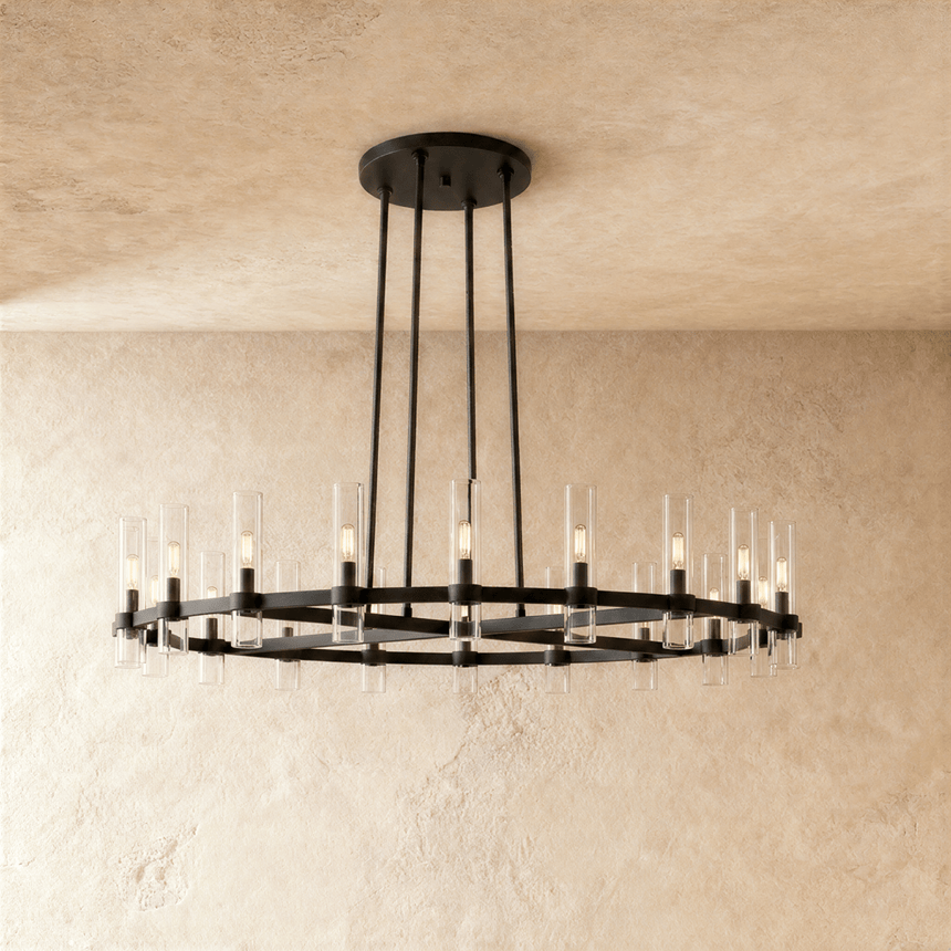 The same wide ring in black, glass candle tubes lit around its full circumference