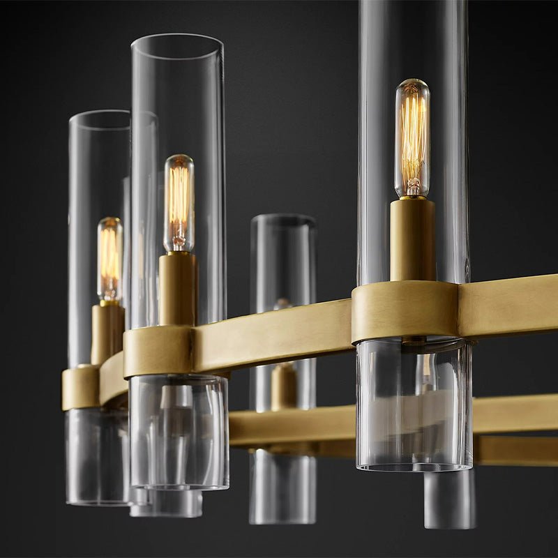 Two glass candle tubes lit close, each holding a visible filament style lamp