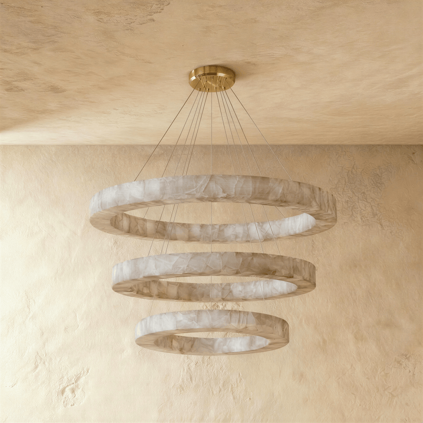 Three graduated stone rings hung one below the other, unlit