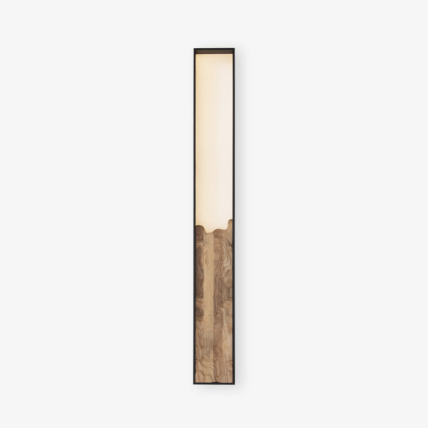 The full bar lit, a long diffuser above a carved wood panel in a dark frame
