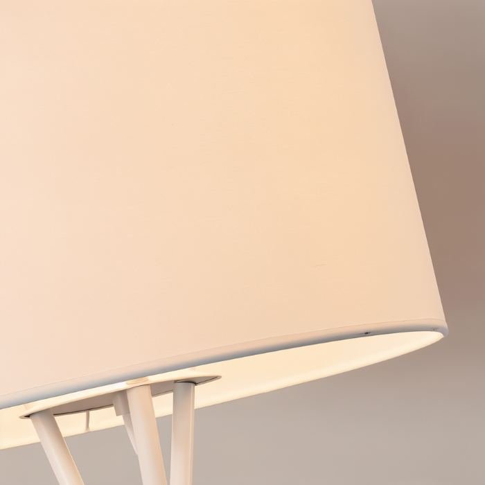 The underside of the drum shade, the fabric lit evenly from inside the rim