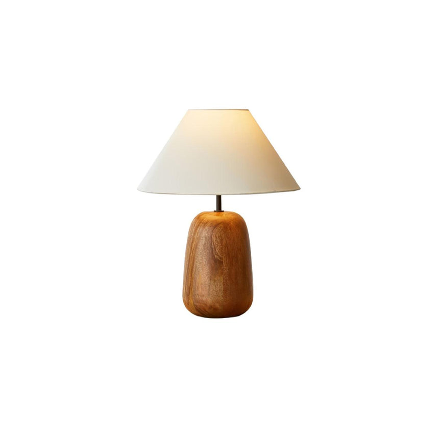 Medium farmhouse table lamp seen alone against a plain pale background