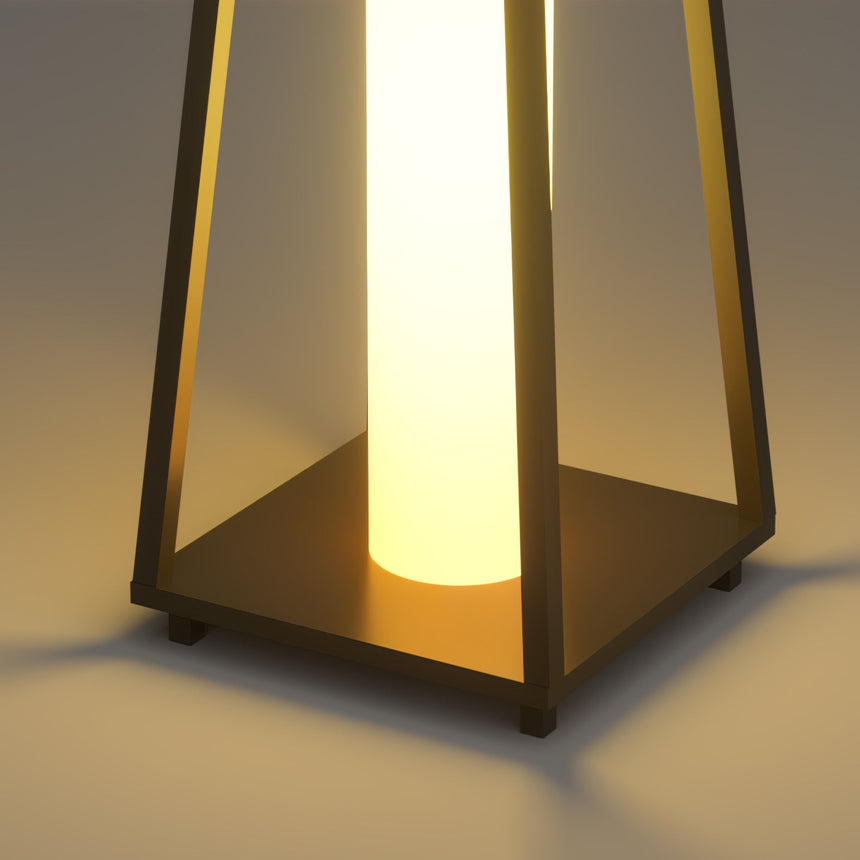 The lit panel seen close inside the open tapered frame