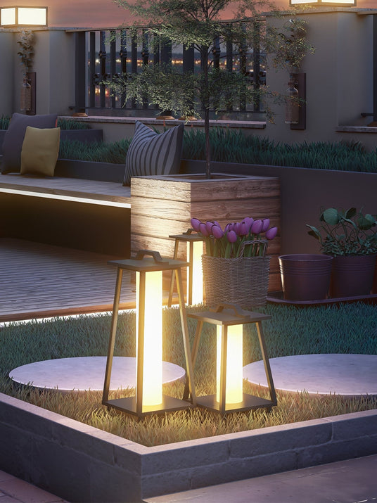 Two lit beside a raised planter bed with potted plants around it