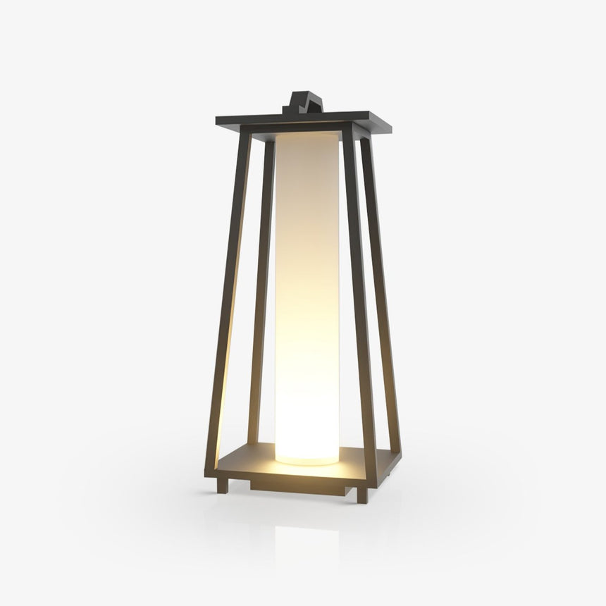 Tapered open frame lantern in dark metal with a lit inner panel