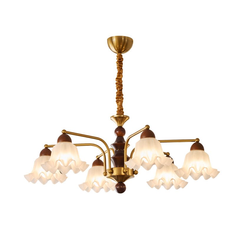 The eight light build with fluted bells ringed around the stem