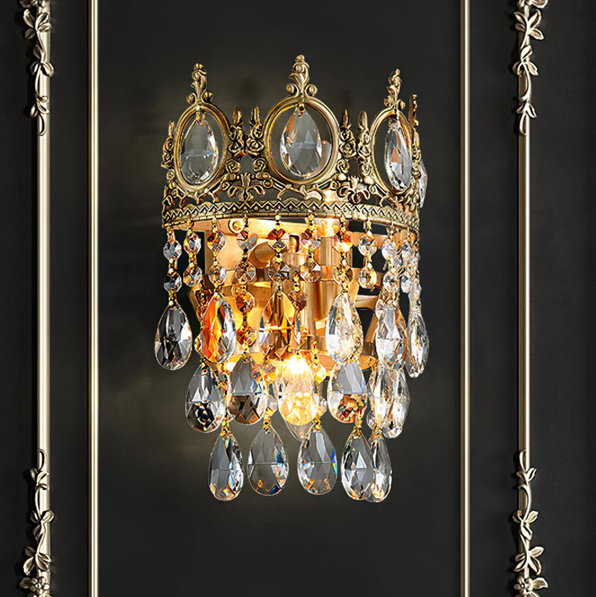 The crown lamp lit on a black wall with gold molding