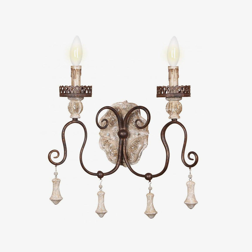 The two arm sconce at an angle showing how far the arms reach from the wall