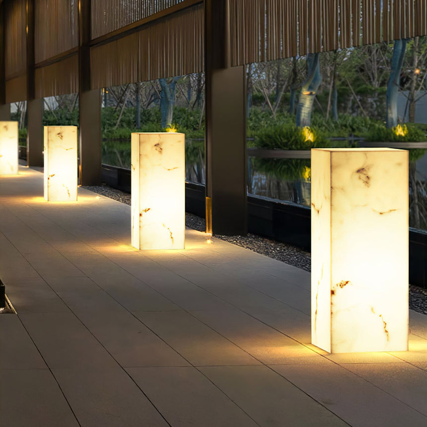 A run lit along a paved terrace with veining showing in each body