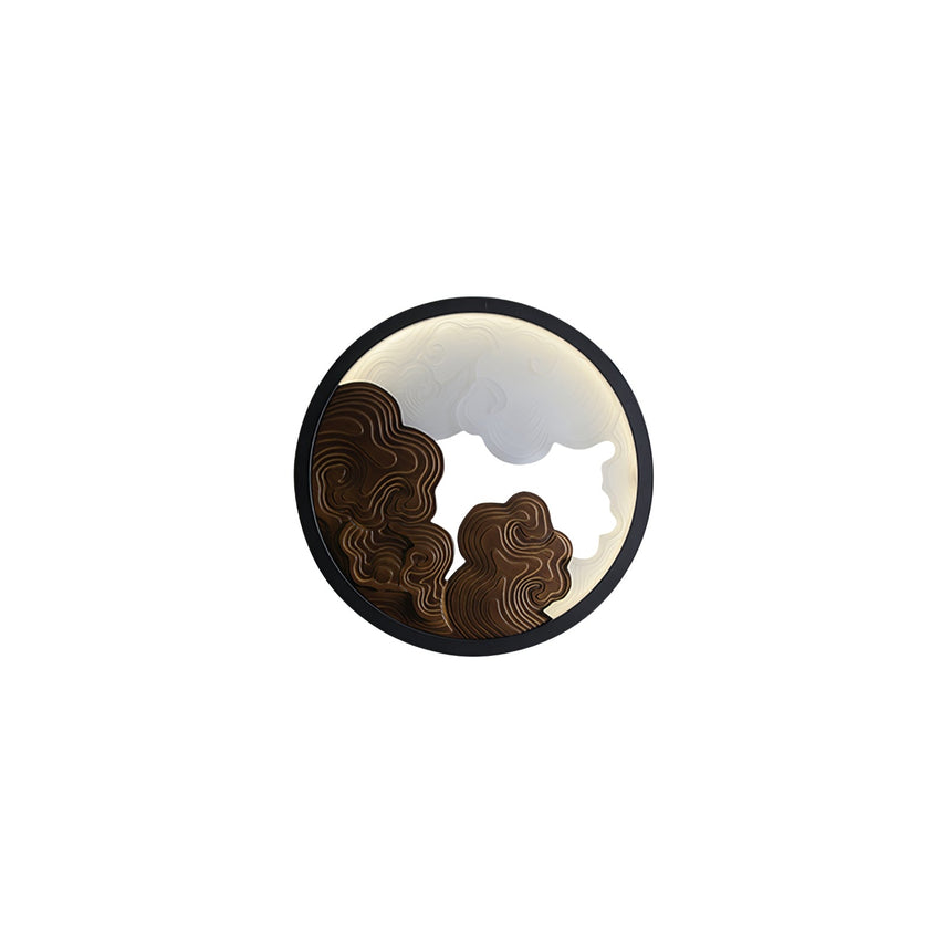 The walnut relief version with the lit disc showing between the layers
