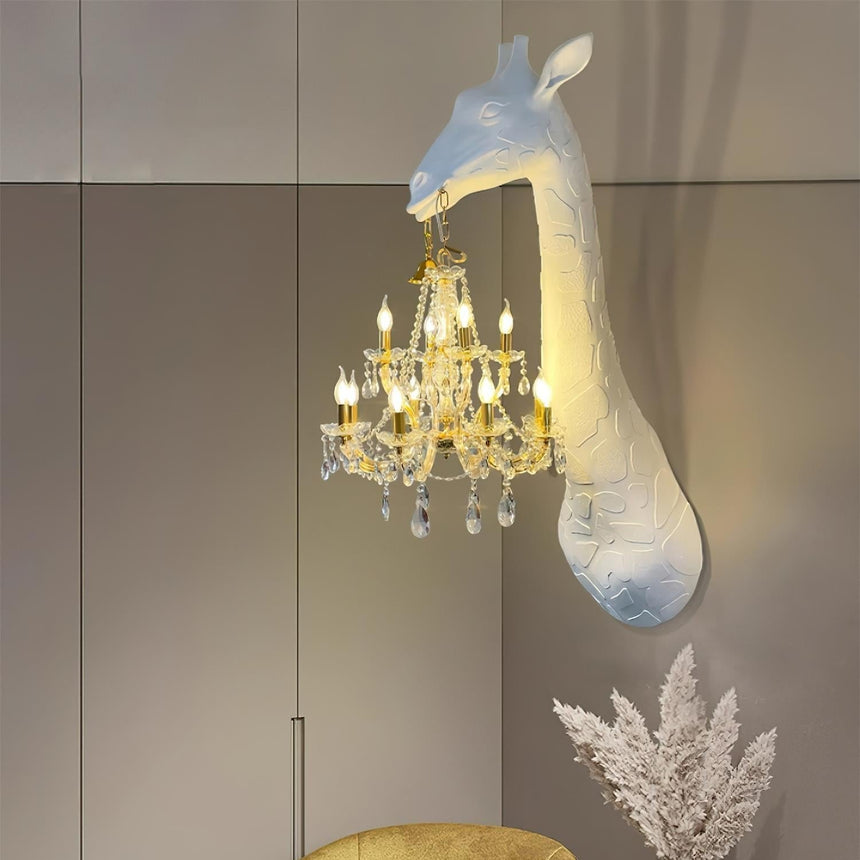 The giraffe lamp on a wall of gray cabinets above a yellow chair and dried grasses