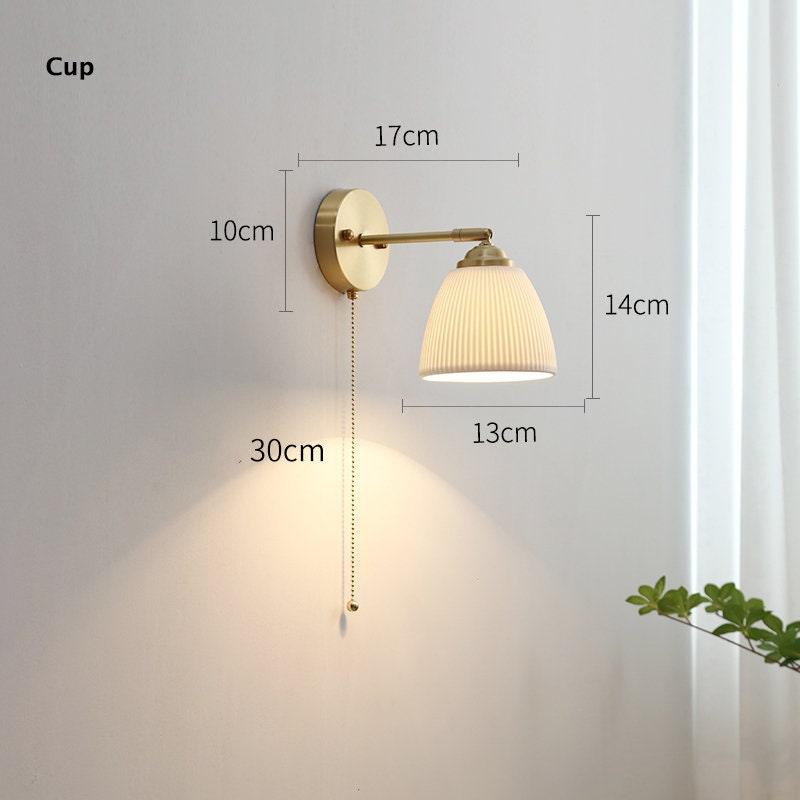 Warm glow lantern wall sconce for hallway