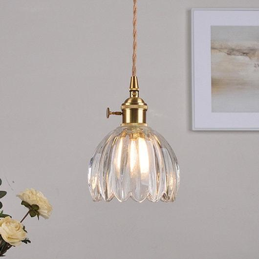 Brass pendant lamp glass ball shape close-up