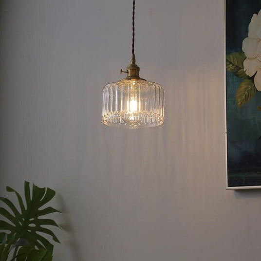 Brass pendant light side angle detail view