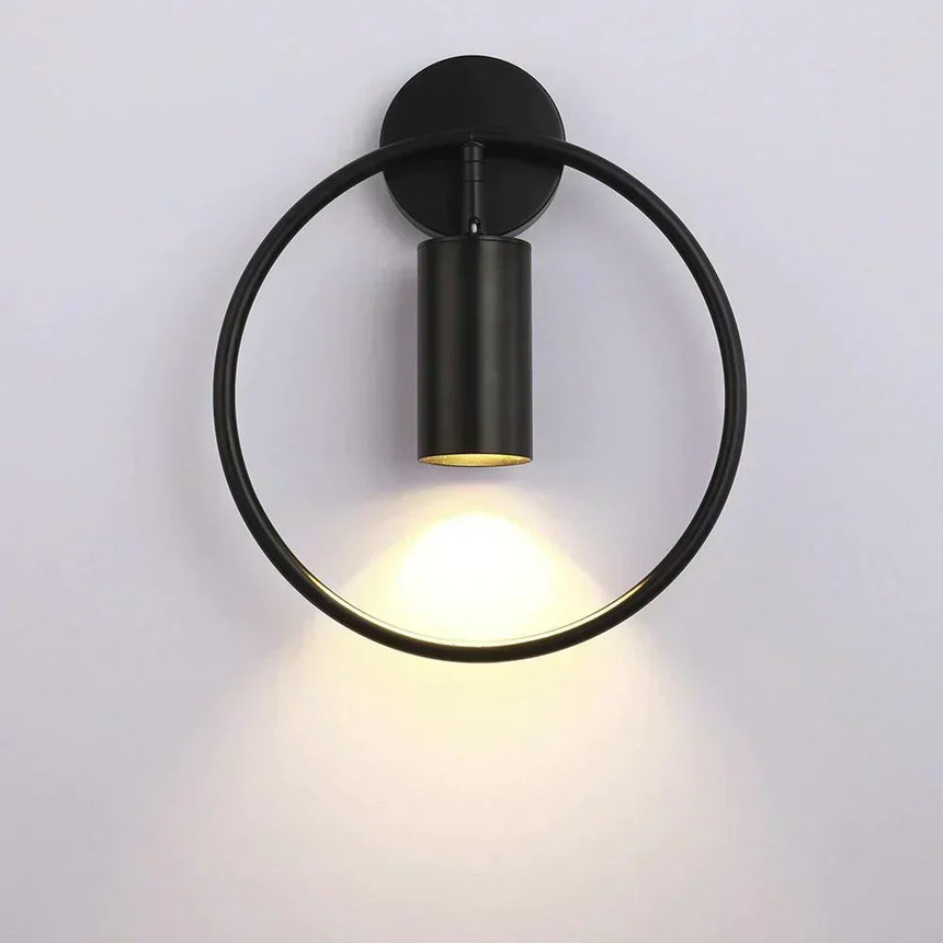 Aluminium and iron detail on wall lamp