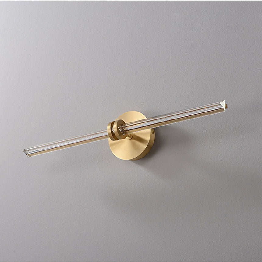 The rod unlit at an angle, the plate flat against a plain painted wall