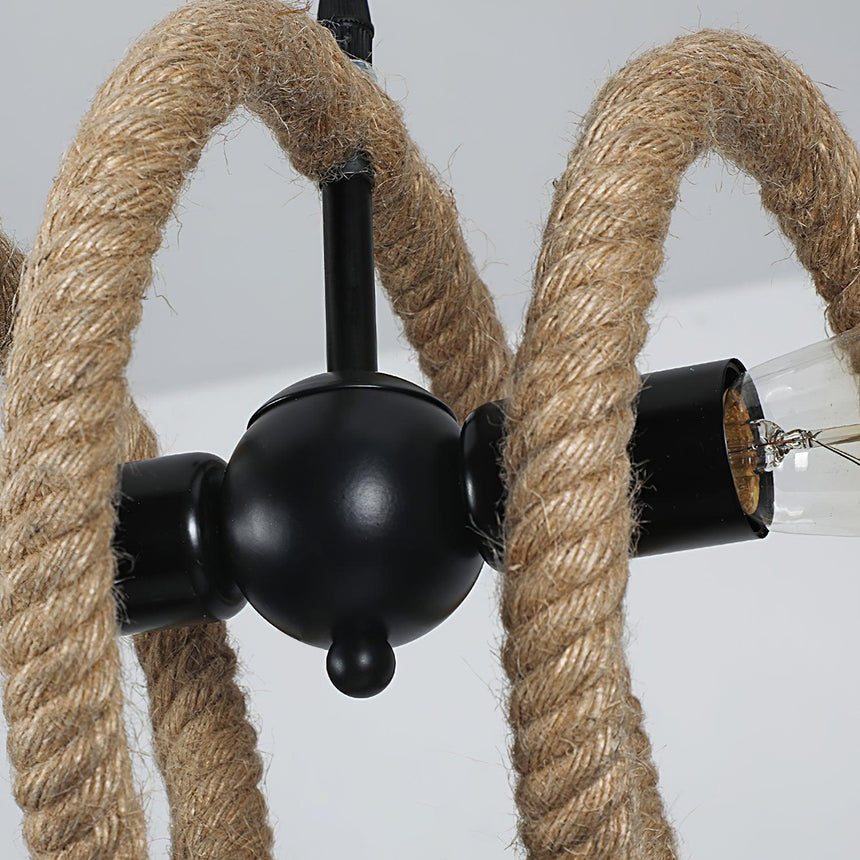 The black iron joint where the two lamp holders meet the rope core