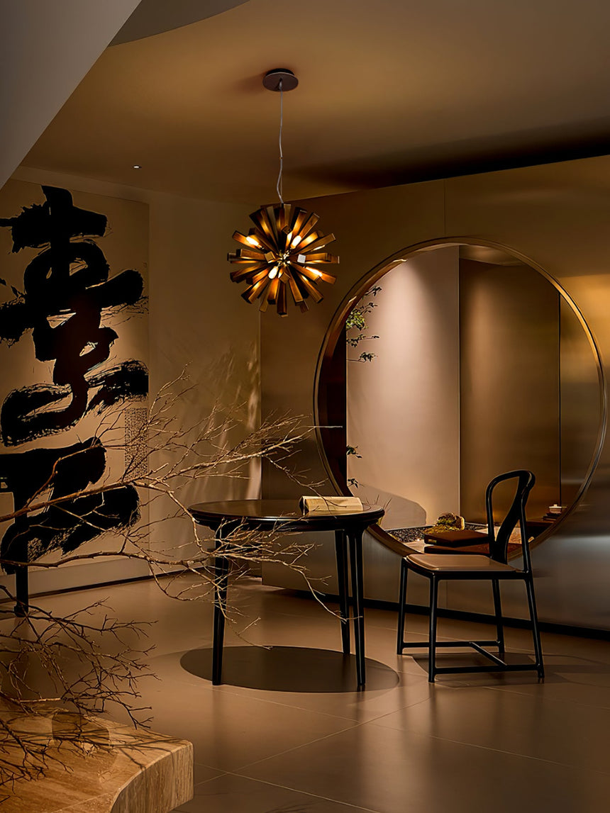 The slats lit in a room with a round mirror and a low sideboard