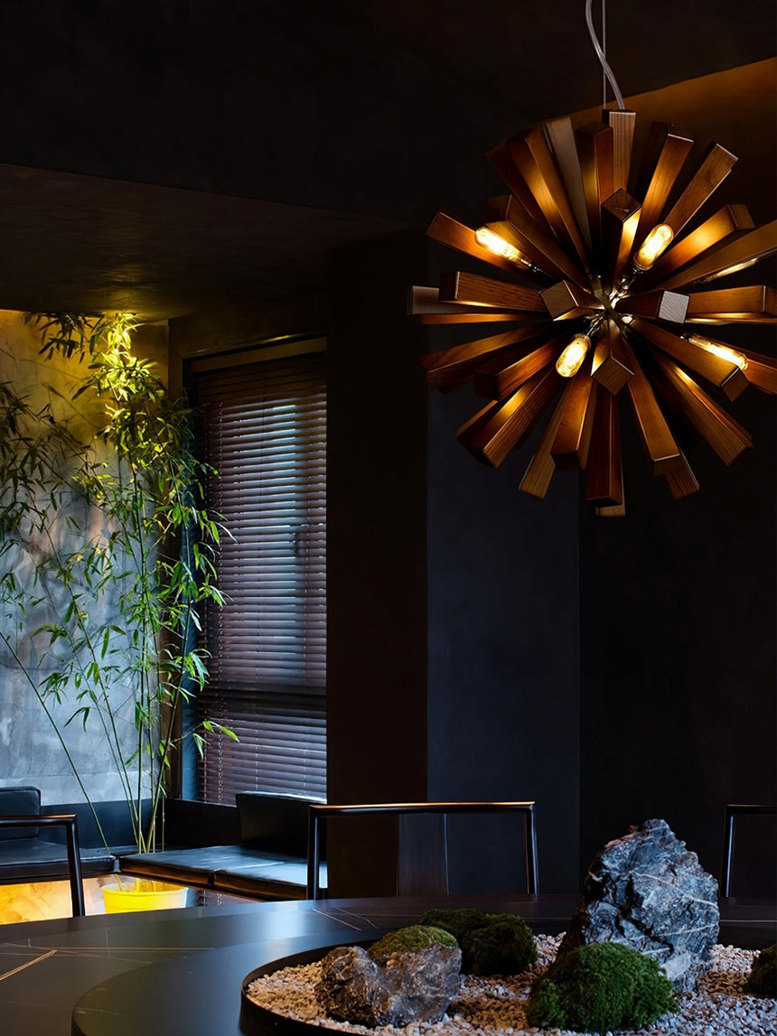 The burst lit in a dark room above a stone basin and planting