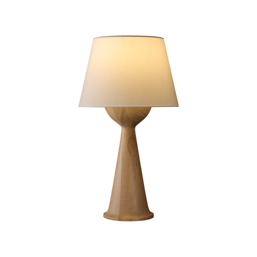 Walnut Japandi table lamp lit and seen from the front, plain background