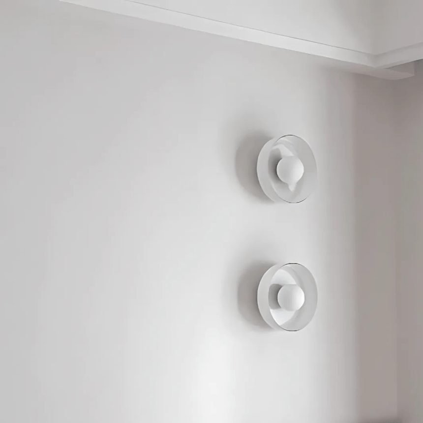 Wall lamp installed in bedroom setting