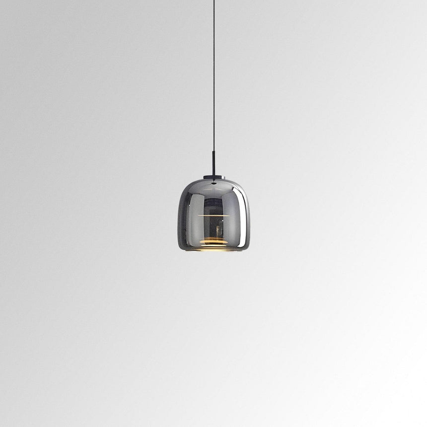Tinted glass pendant light for compact spaces