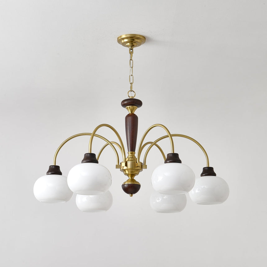 Rounded white opal globes and their walnut collars seen close
