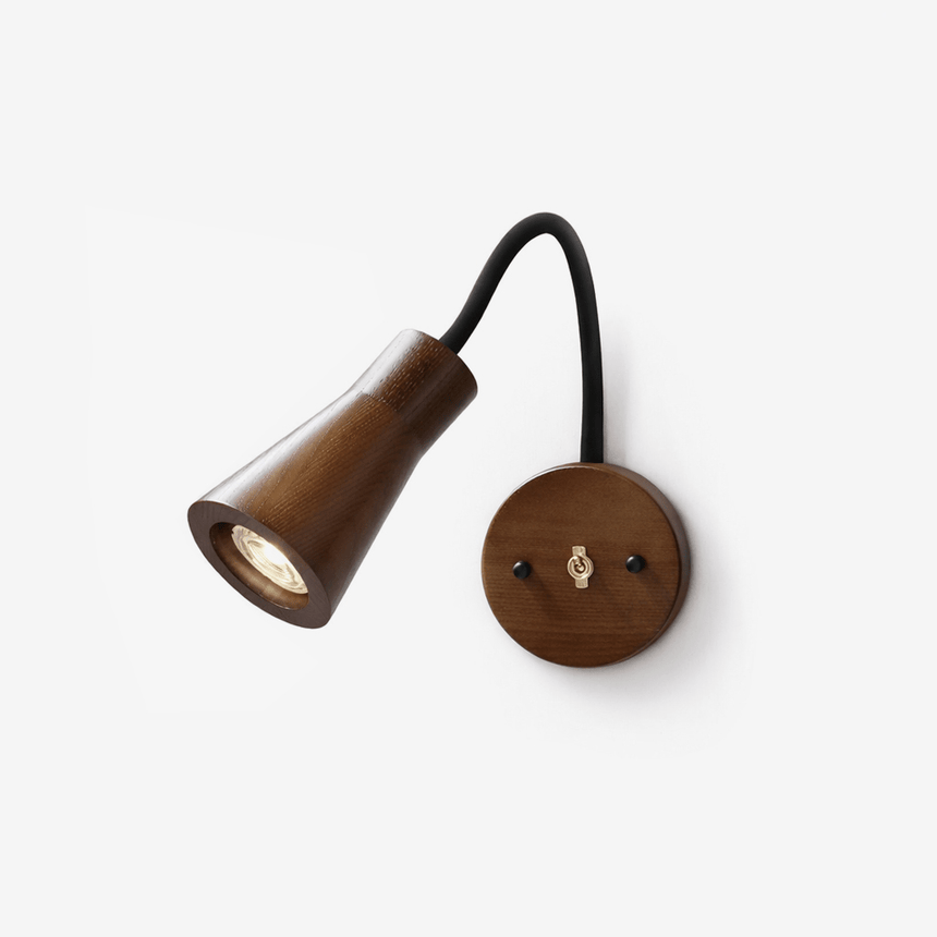Walnut cone head on a black gooseneck arm with a round wood plate