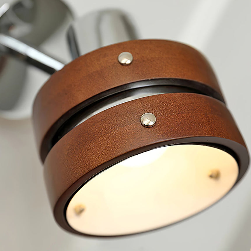 Close view of the walnut drum, its bands and the small chrome studs